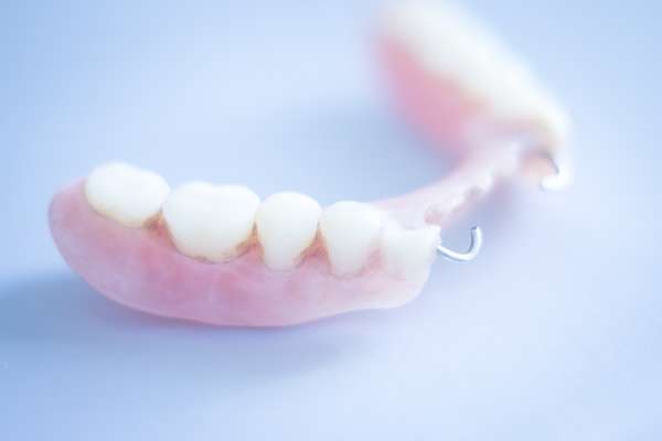 Should I Get Dentures or Dental Implants from SmileWell Family Dentistry in Torrance, CA